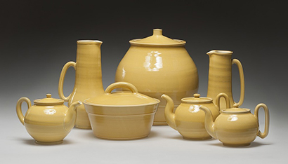 Yellow ceramic tea set.