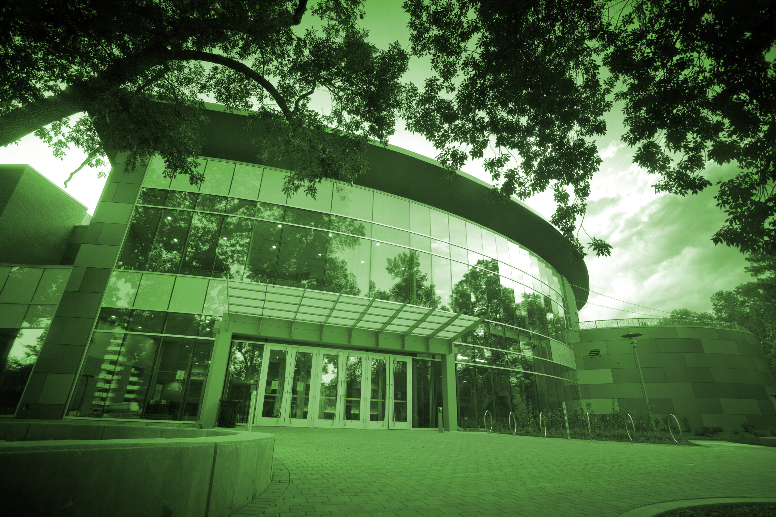 Photo of The Lincoln Center in only green shades.