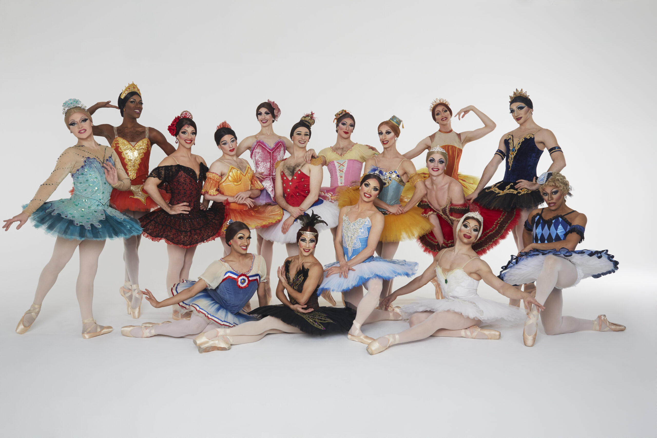 A group photo of colorful ballerinas in drag.