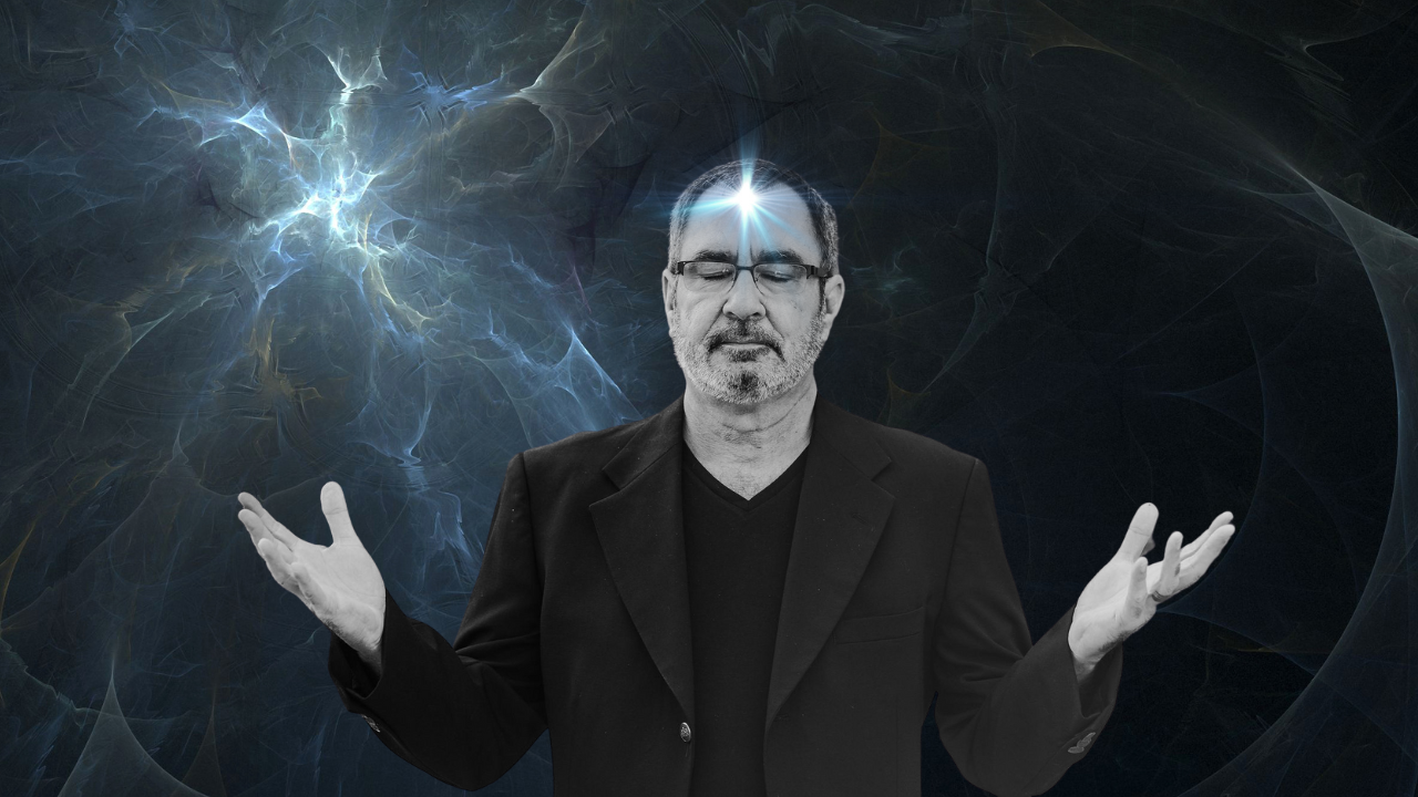 Man with glasses stands with arms open and lightening in background.