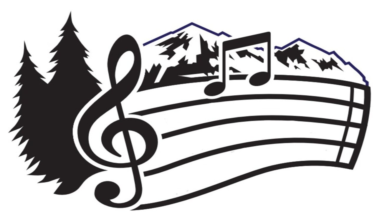 Music notes and mountain scenery.