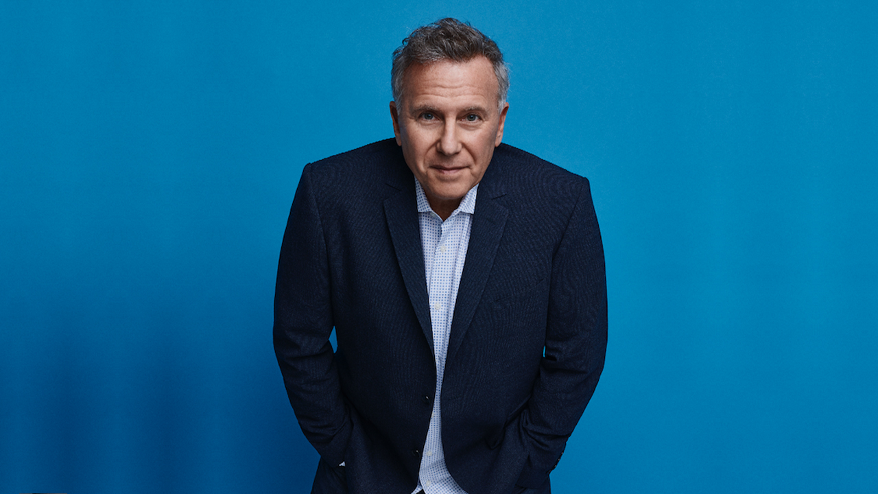 Paul Reiser smiling.