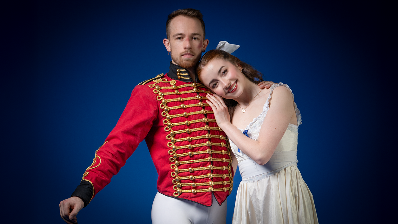 Ballet dancer Clara and the Nutcracker lean on each other