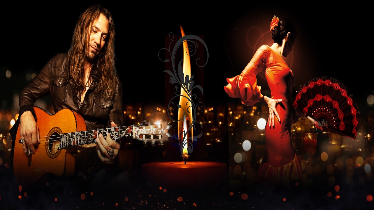 A man plays guitar next to a candle and a dancing woman in moody dark lighting.