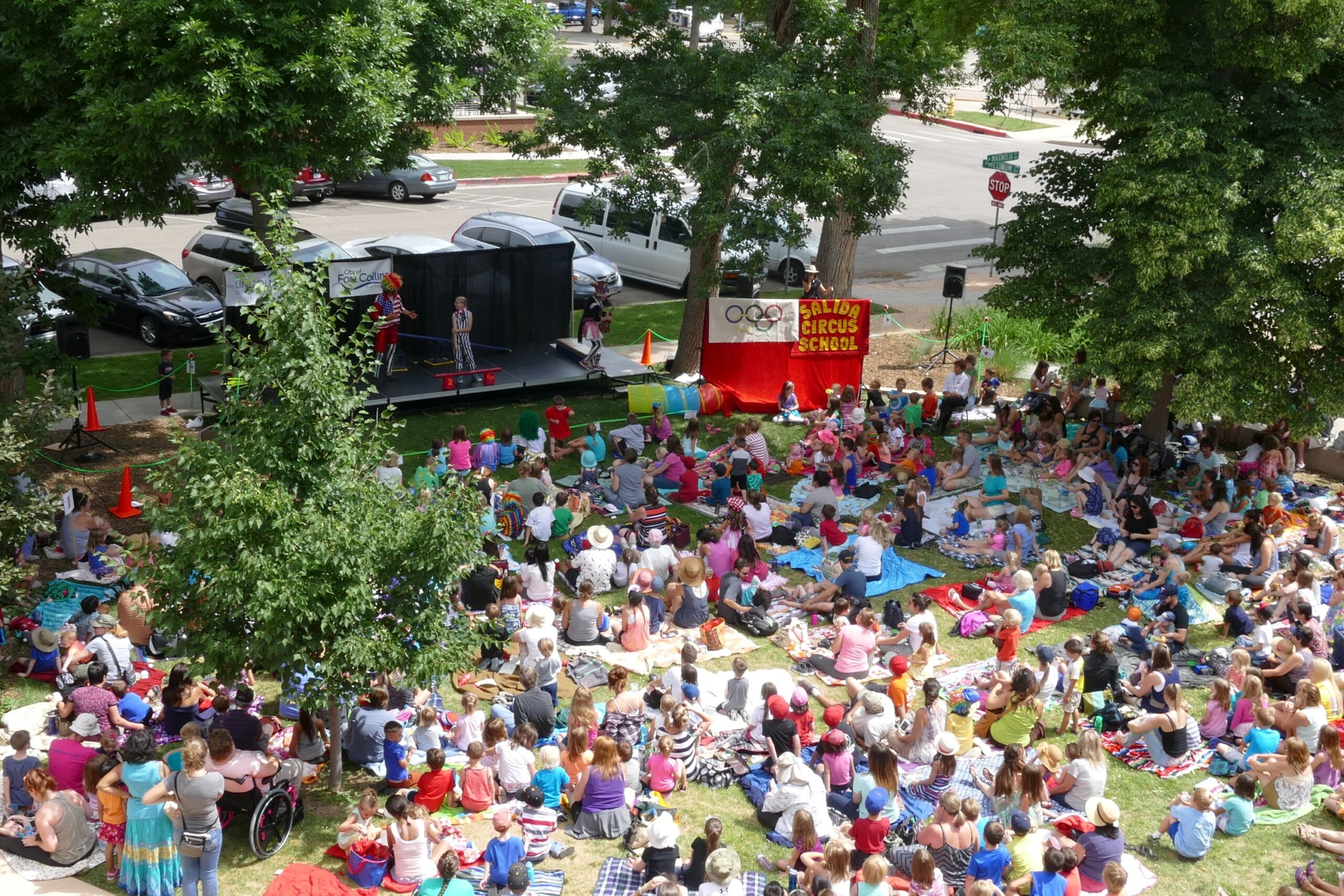 image from above of the audience at a Children's Summer Series show on The Lincoln Center lawn