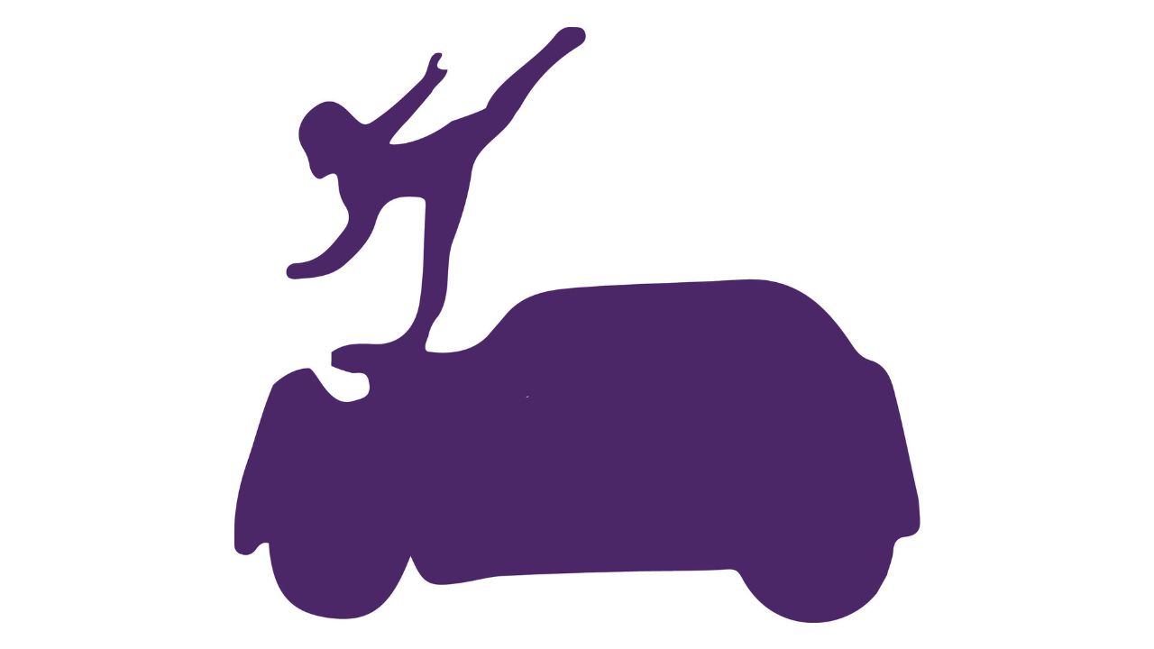 dancer does arabesque on top of car hood