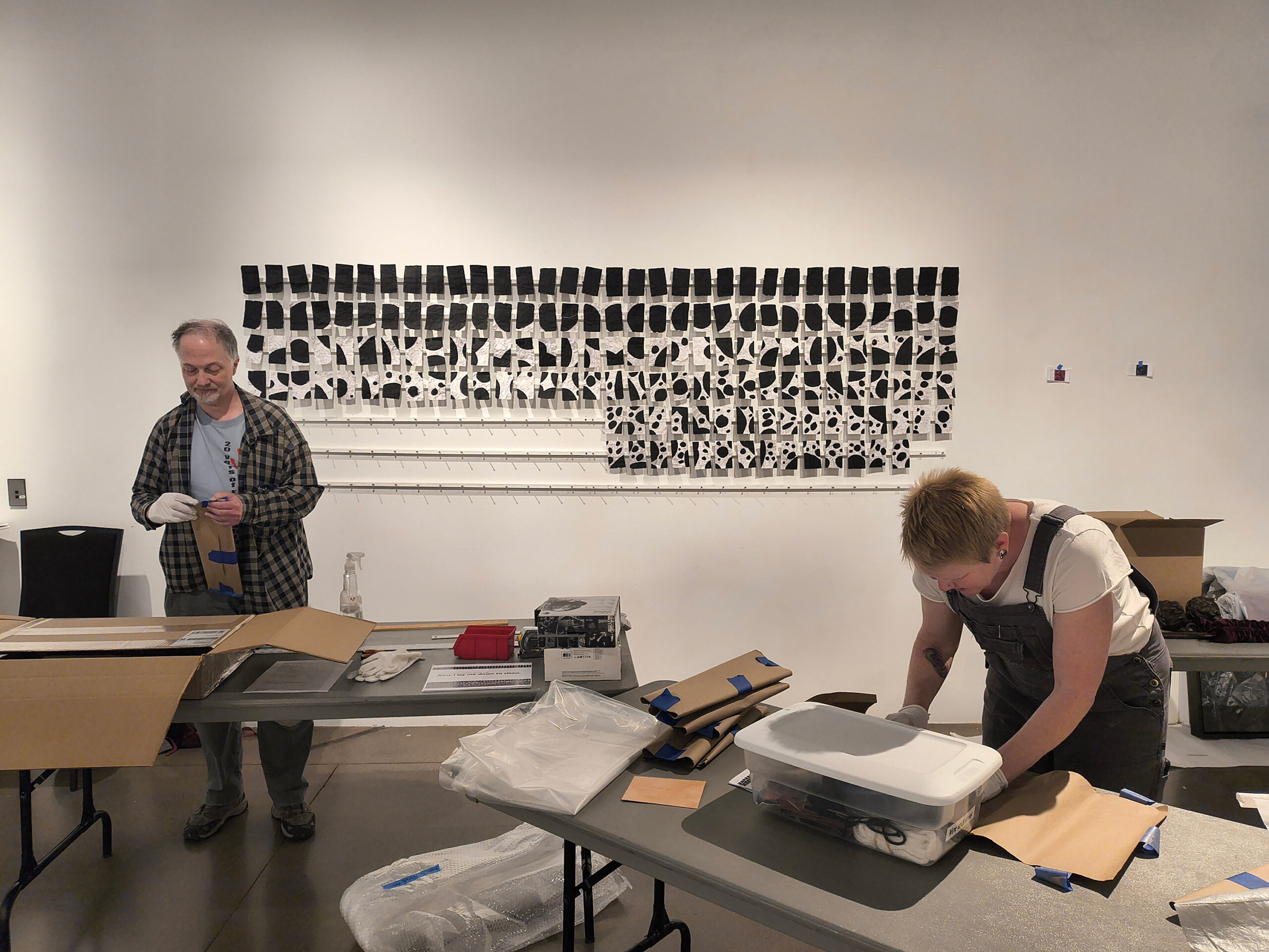 The LIncoln Center Art Gallery staff setting up an exhibit.