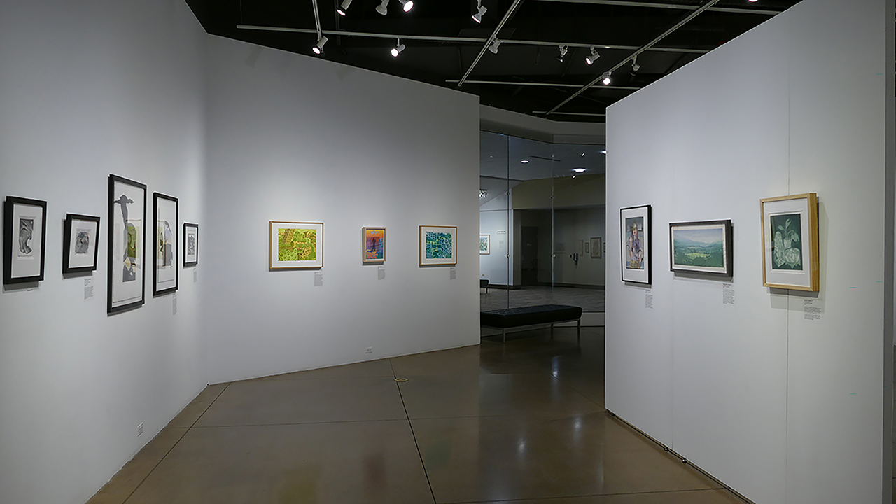 Under Pressure: 2024 National Printmaking Exhibition image of gallery with art hanging on the walls.