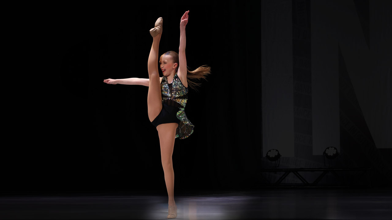 Dancer kicking on stage