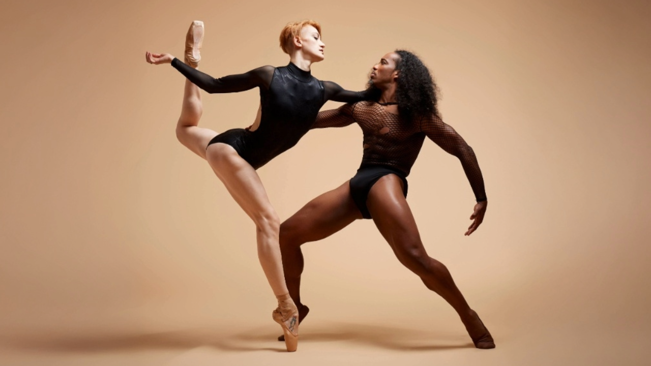 Two Complexions Contemporary Ballet dancers in a striking ballet pose