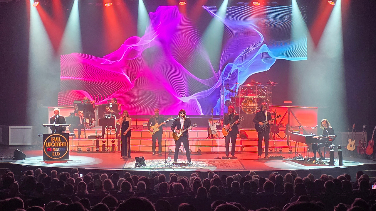 EVIL WOMEN The American ELO performing on stage in front of an audience