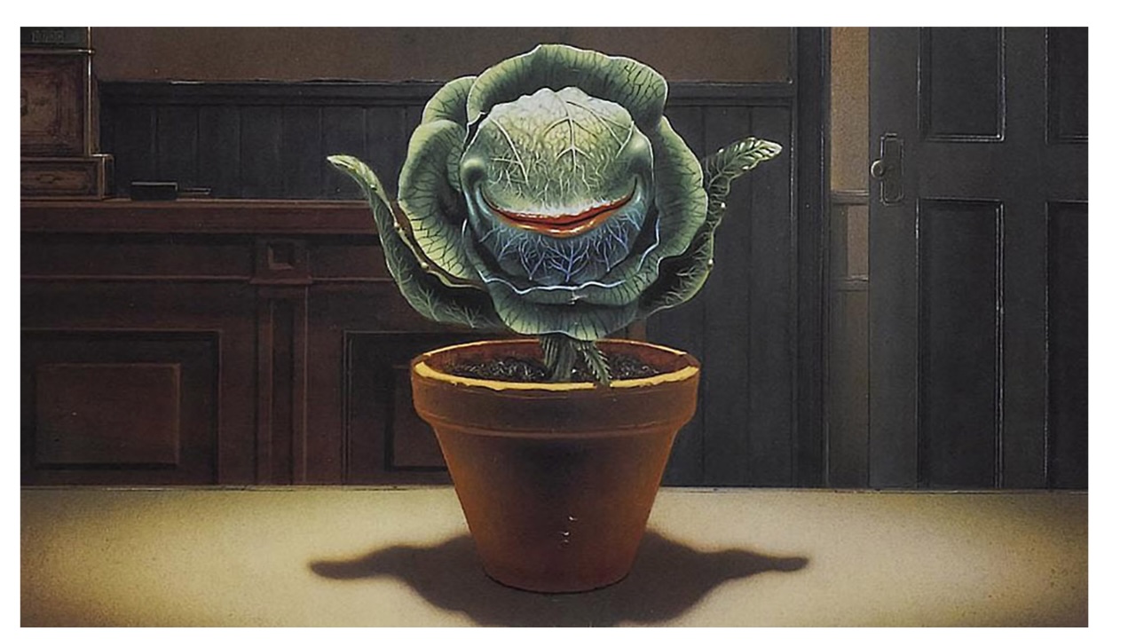 Little Shop of Horrors plant smiling in it's plant